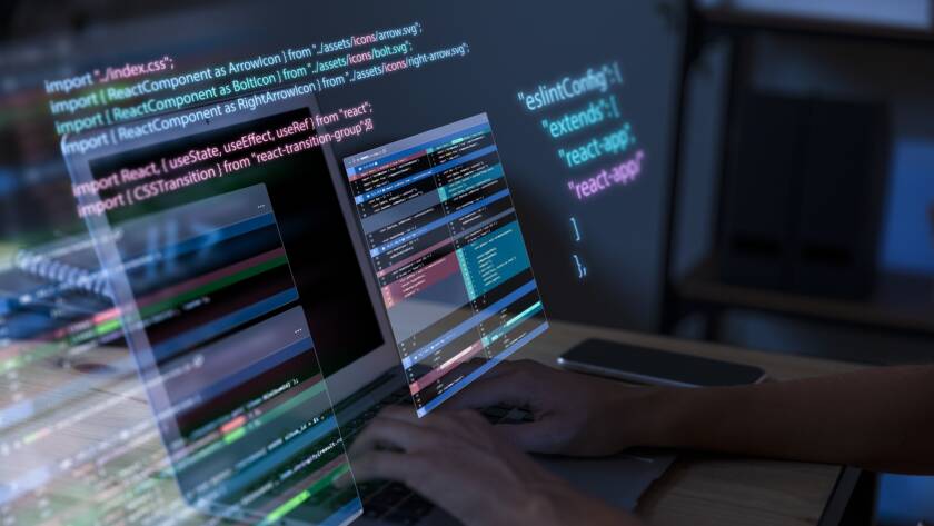 Programming background with person working with codes computer